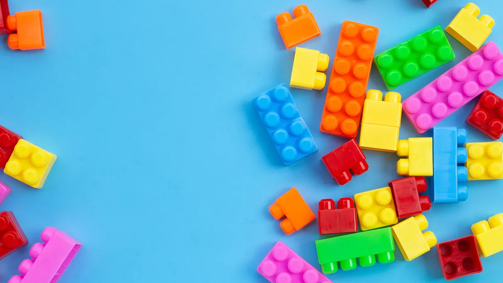 Colorful building blocks laid out for toddler play