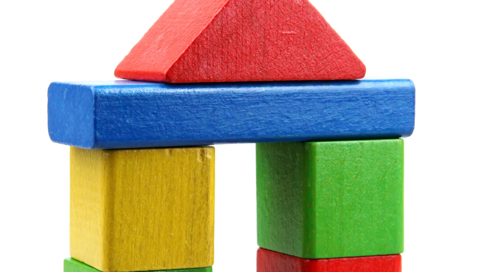 Wooden building blocks stacked for fine motor practice