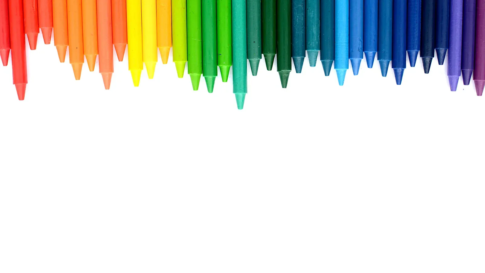 Wax crayons lined up in a row for simple toddler craft projects