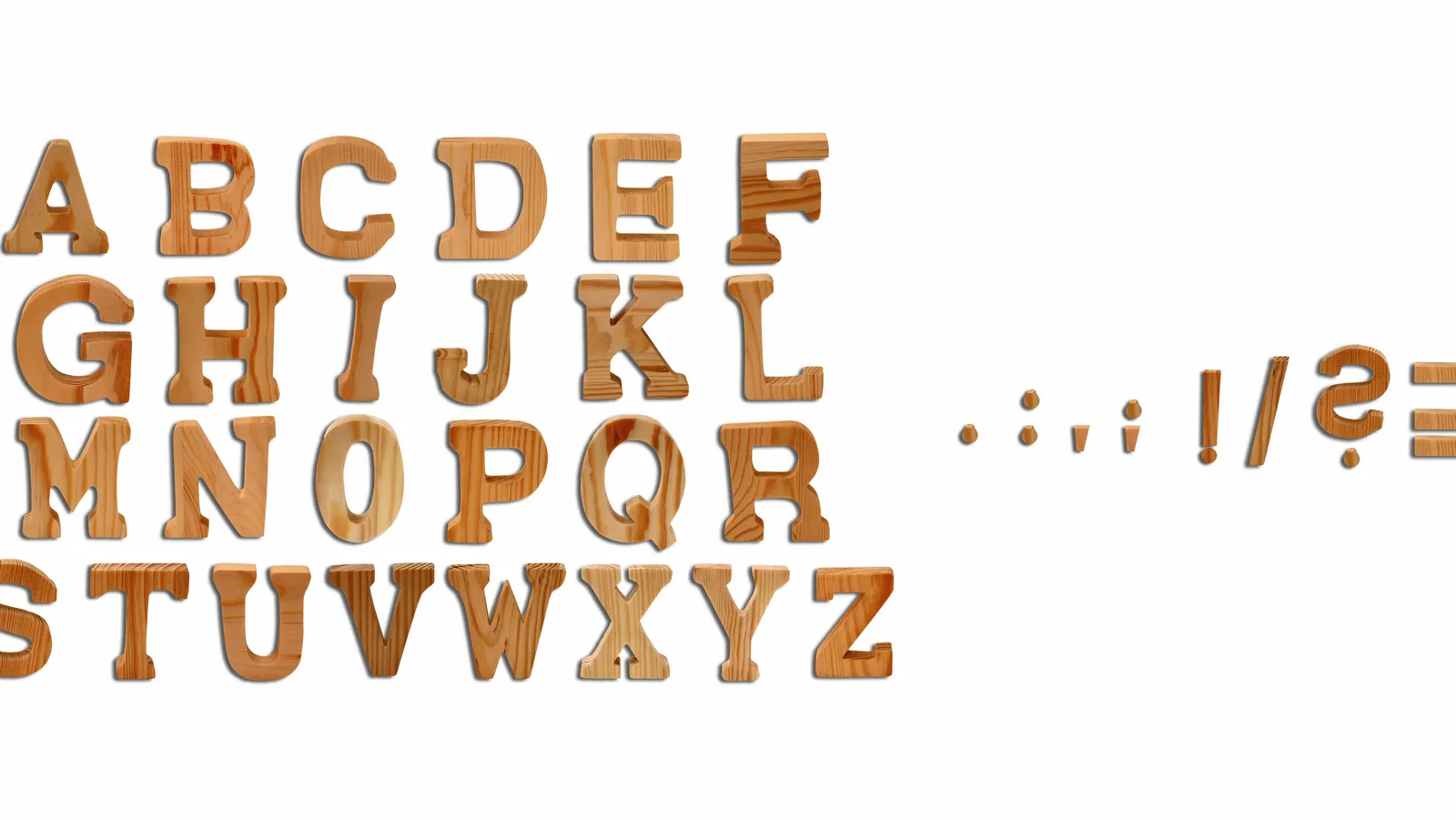 Wooden alphabet letters laid out in a row on white