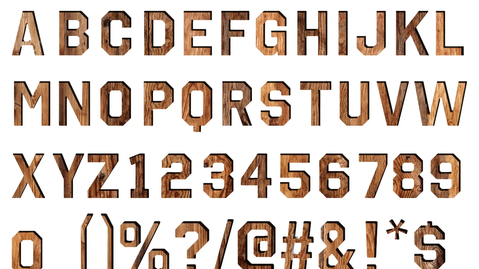 Vintage-style wooden letter blocks arranged on a warm neutral surface