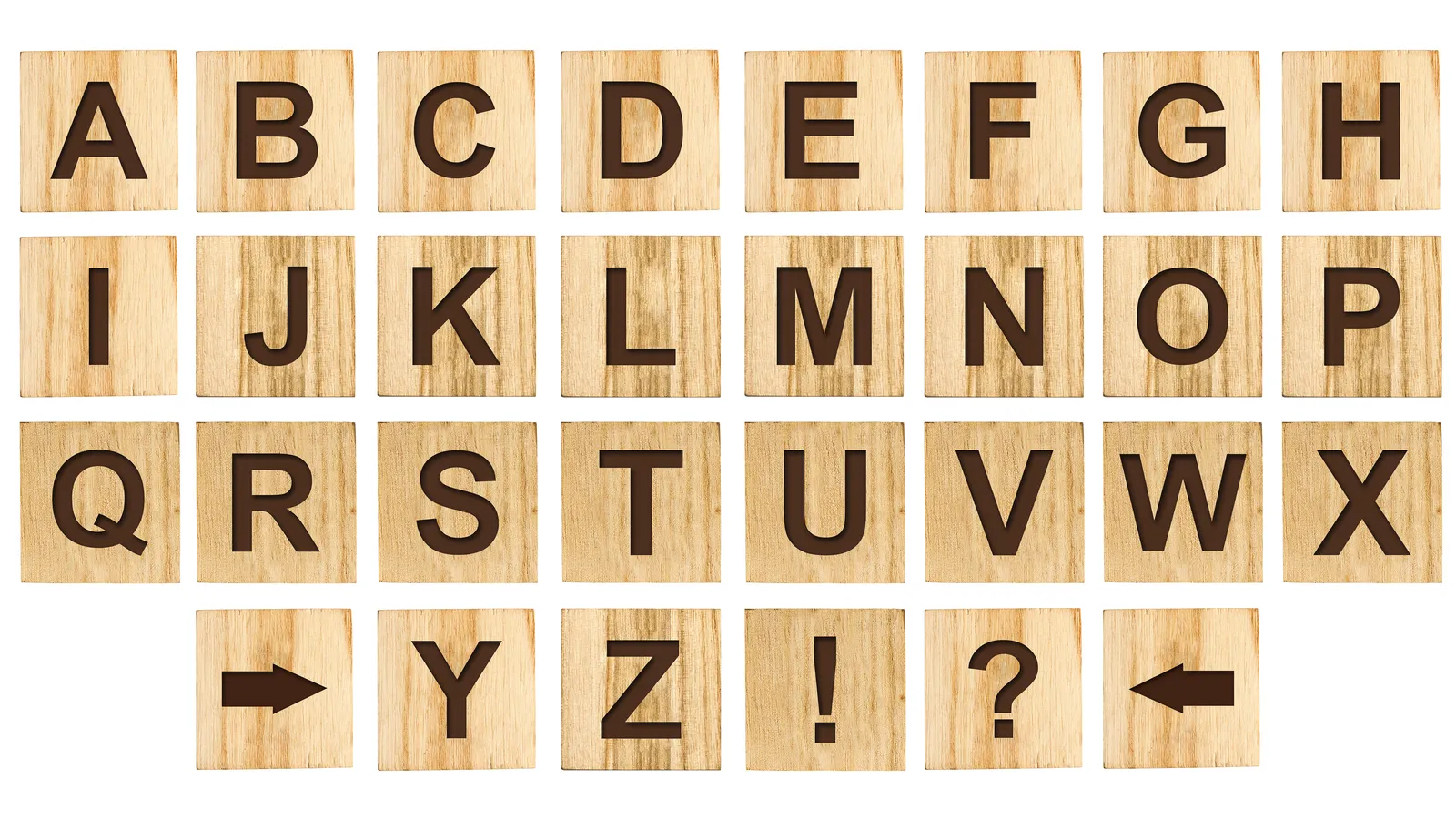 Wooden alphabet letter blocks arranged on a soft neutral background