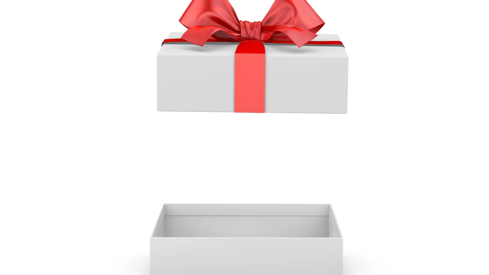 Birthday gifts wrapped in non-festive paper with ribbon on a plain surface